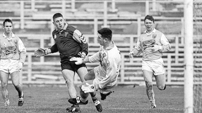 CASEMENT COMBAT: Roscommon's Frankie Dolan finishes past Antrim goalkeeper Donard Shannon in the Connacht side's National League win at Casement Park