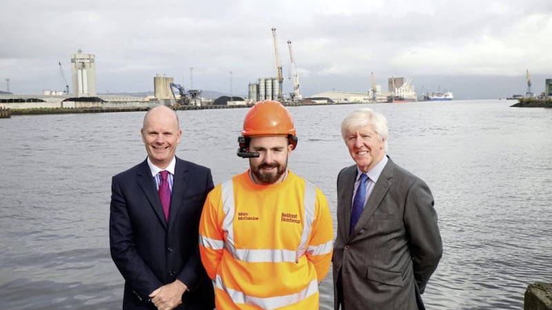 Belfast Harbour chief executive Joe O&#39;Neill and BT Enterprise chief executive Gerry McQuade with harbour technician Marc McCombe, testing out a hands-free augmented reality headset 