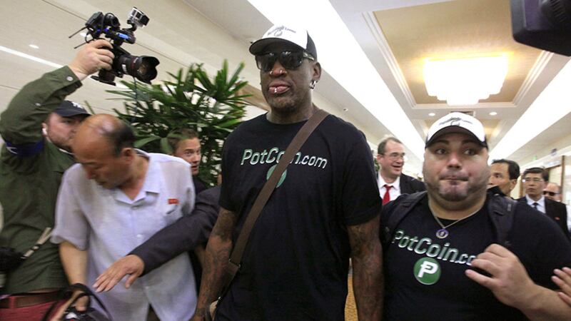 Former NBA basketball star Dennis Rodman, centre, arrives at Sunan International Airport on Tuesday, June 13, 2017, in Pyongyang, North Korea. Rodman has arrived in North Korea on his first visit since President Donald Trump took office&nbsp;
