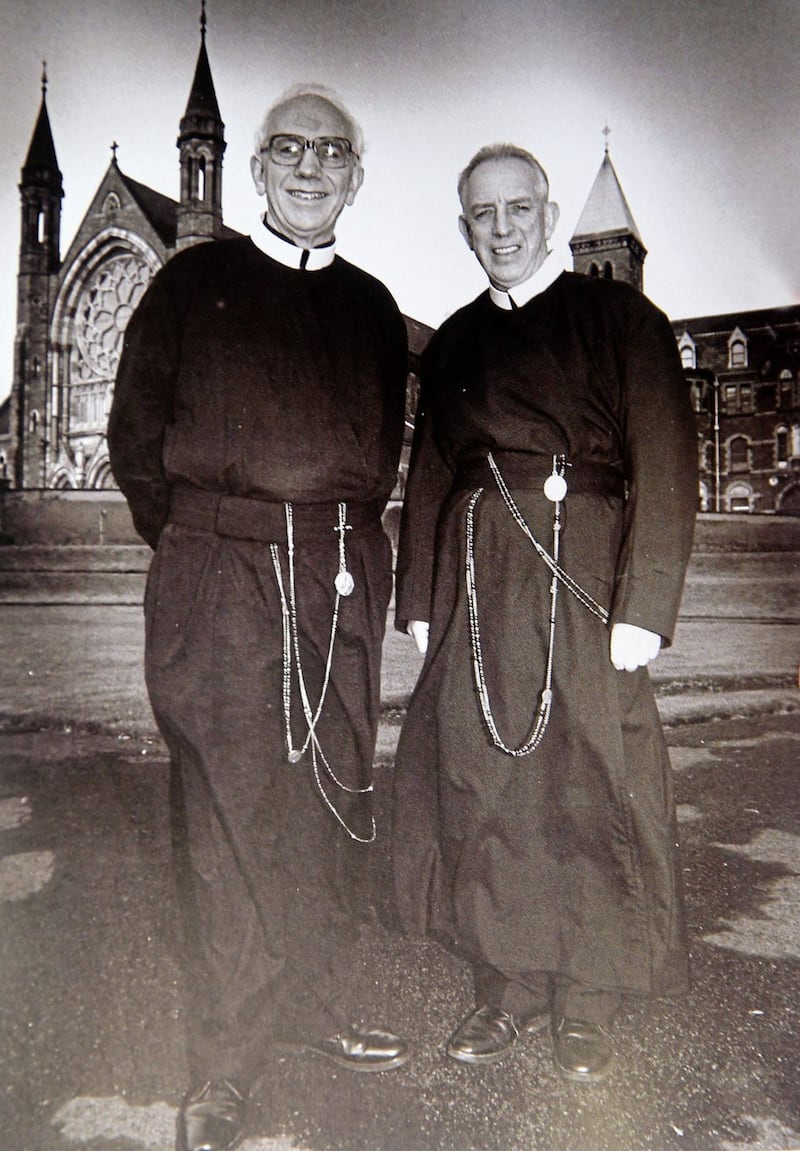 Fr Gerry and Fr Alec Reid, partners in the Peace Process, in the gardens of Clonard Monastery 