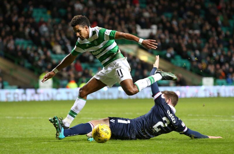 Celtic's Scott Sinclair is tackled by Ross County's Marcus Fraser during the Ladbrokes Scottish Premiership match at Celtic Park&nbsp;