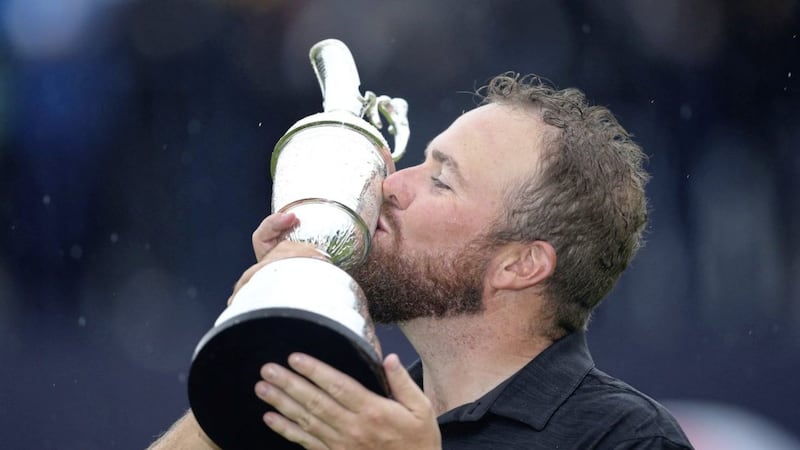 Shane Lowry celebrates with the Claret Jug after winning the Open Championship at Royal Portrush Golf Club on Sunday <br />Picture by PA