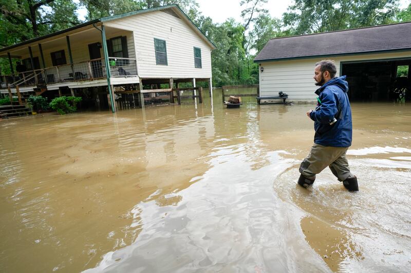 Heavy rains have brought flooding to Houston (Houston Chronicle via AP)