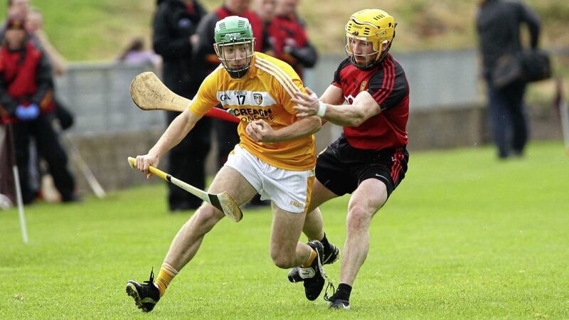 Antrim&#39;s Ruairi Diamond comes under pressure from Down&#39;s Malachy Magee in the Christy Ring Cup semi final game at Cushendall Picture by Seamus Loughran 
