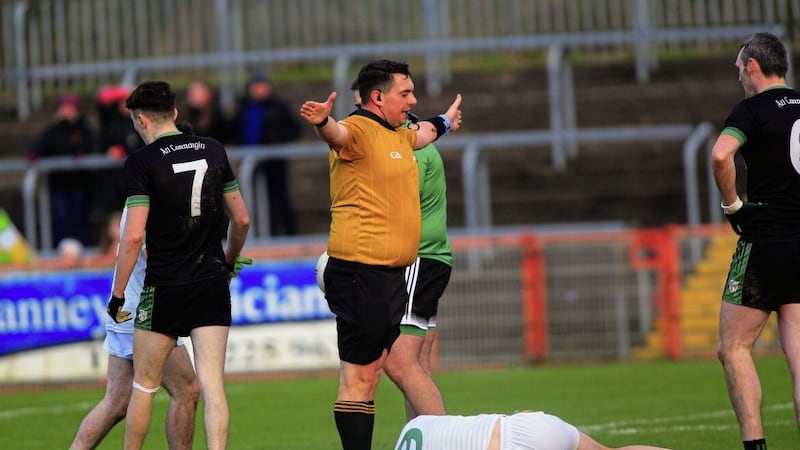 Referee Kieran Eannetta awards an added time penalty to Glen against Cargin in the Ulster Club SFC semi-final game at Healy Park. Picture Seamus Loughran 