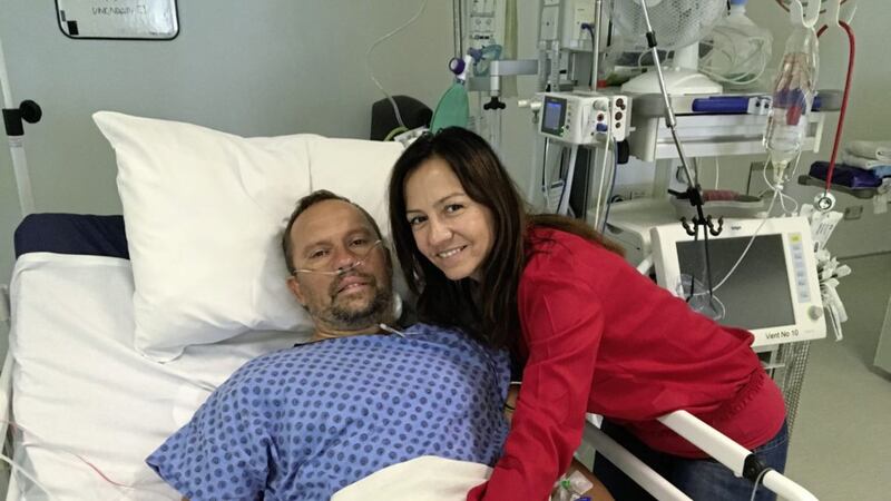 Hungarian long distance swimmer, Attila M&aacute;nyoki, from Budapest, pictured recovering in the Ulster Hospital in Belfast alongside his partner, Monika Pais 