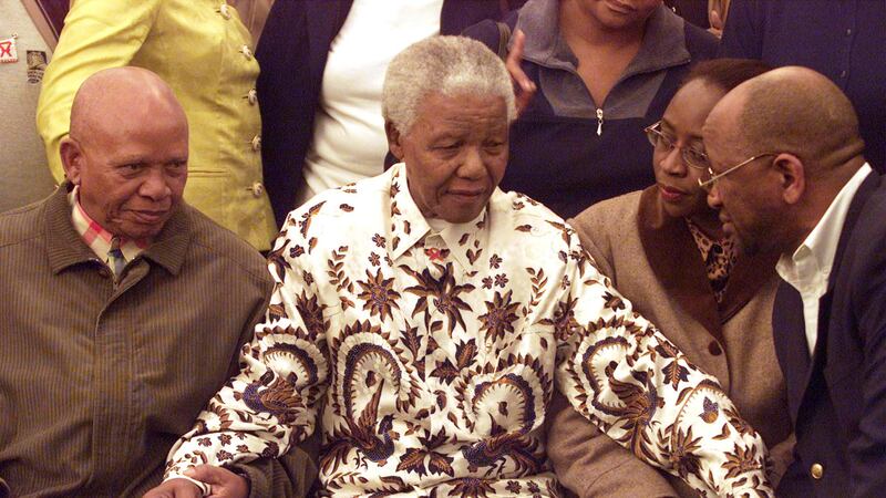 Former South African president Nelson Mandela, whose belongings were due to be auctioned online in February (Themba Hadebe/AP)