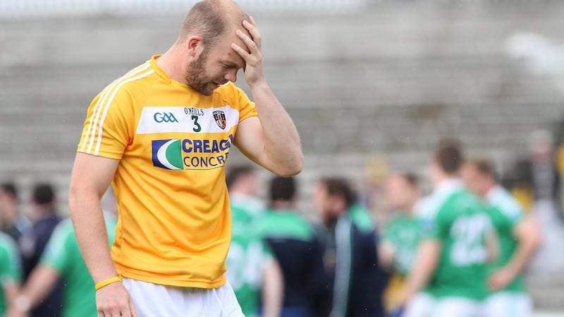 Se&aacute;n McVeigh can't hide his despair during Antrim's heavy Qualifier defeat to Fermanagh<br />Picture: Colm O'Reilly&nbsp;