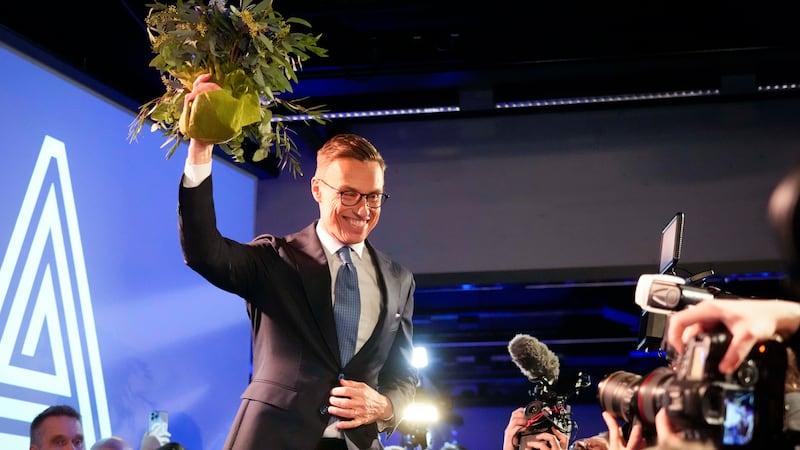 National Coalition Party candidate Alexander Stubb celebrates after winning the second round of the presidential election during an election party night in Helsinki, Finland (Sergei Grits/AP)