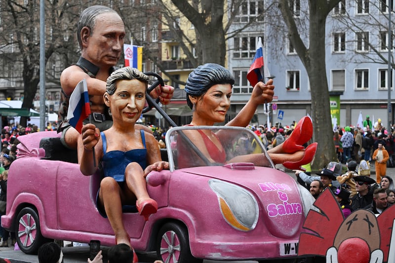 A float depicting Barbies and Ken, with the characters of Russian President Vladimir Putin Alice Weidel of AfD and Sahra Wagenknecht of BSW (Arne Dedert/dpa via AP)