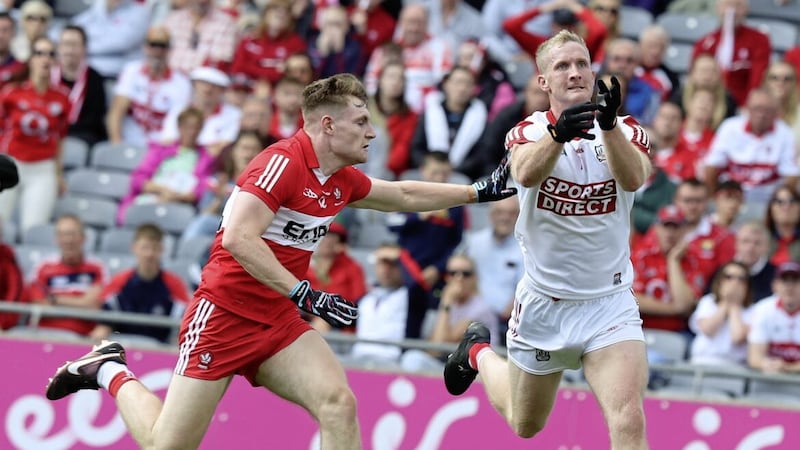 Derry&#39;s Ethan Doherty and Cork&#39;s Ruair&iacute; Deane during Sunday&#39;s quarter-final 