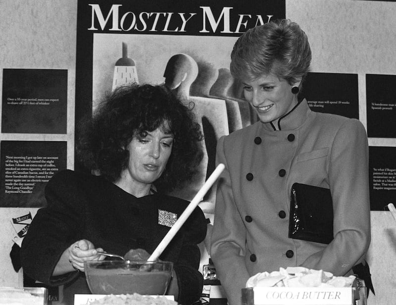 Body Shop founder Anita Roddick gives a demonstration for Diana, Princess of Wales, at the opening of a new headquarters in Littlehampton, Sussex, in 1986