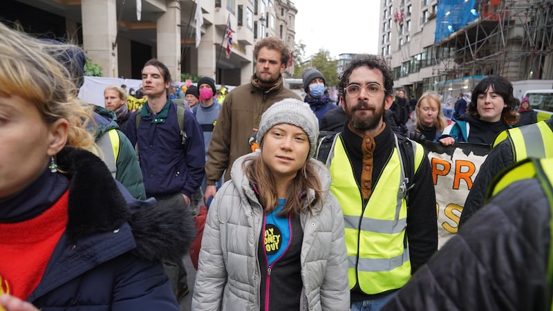 Greta Thunberg joins protesters from Fossil Free London outside the InterContinental in central London (Lucy North/PA)