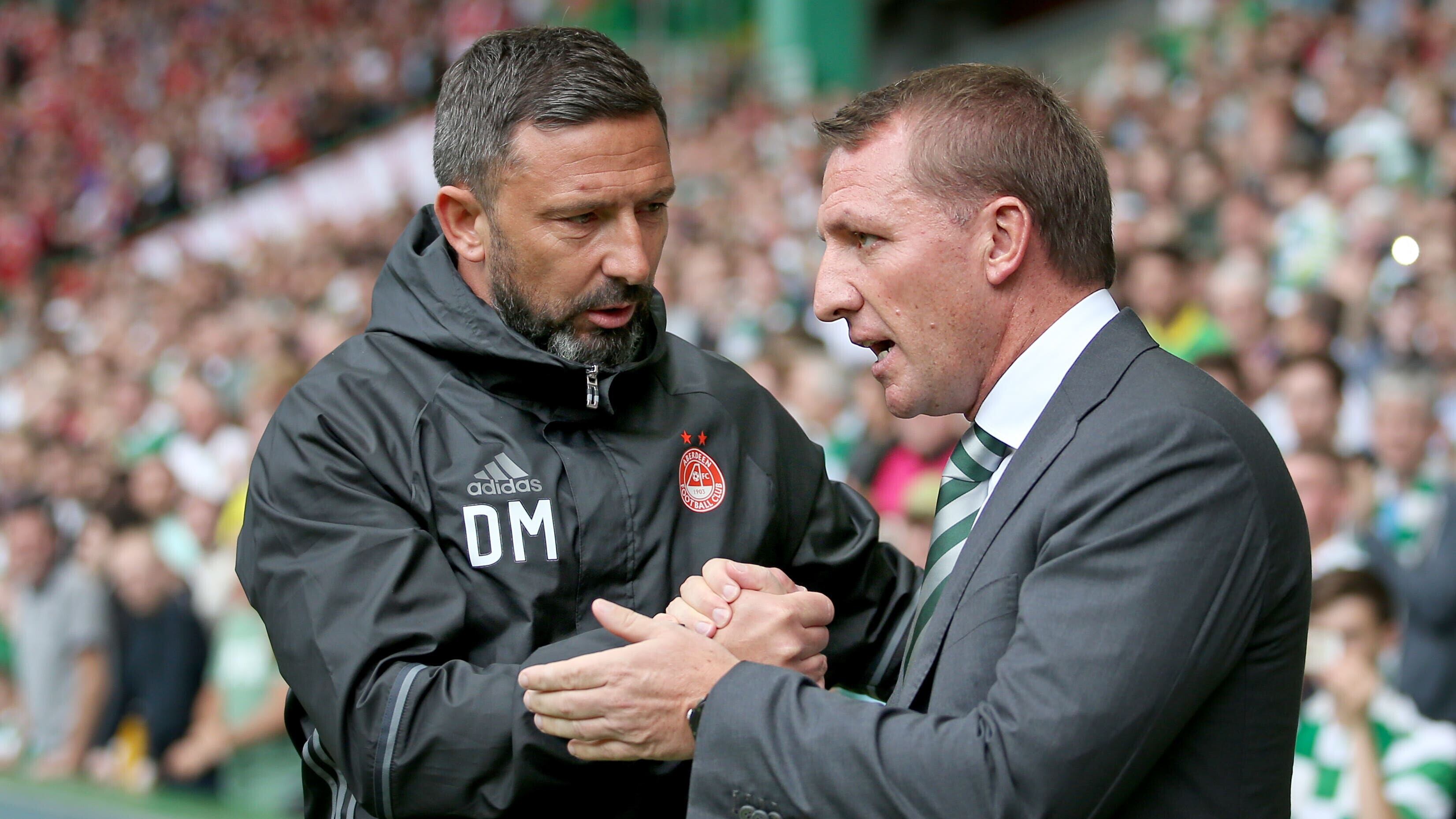 Derek McInnes and Brendan Rodgers will be reunited at Celtic Park (Jane Barlow/PA)