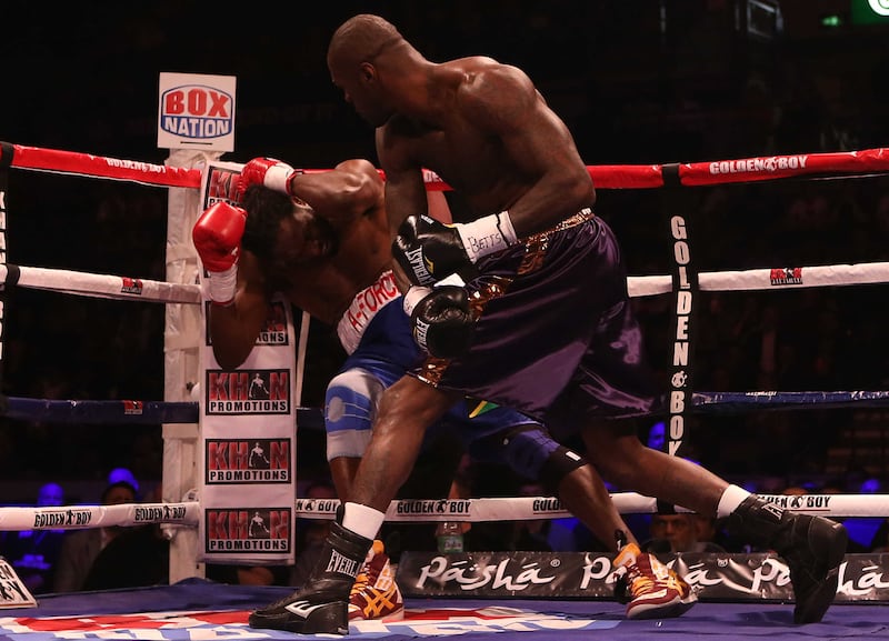 &nbsp;Audley Harrison goes to the floor during his Heavyweight bout against Deontay Wilder, right, at the Motorpoint Arena Sheffield in 2013