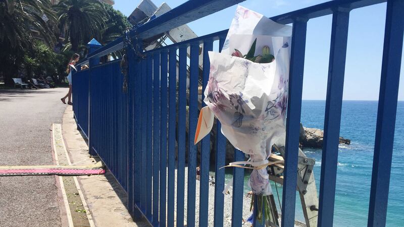 Flowers are left close to the scene where Darren Rodgers, from Ballymena, died after a fall in Nice in France. Picture by&nbsp;Michael McHugh, Press Association