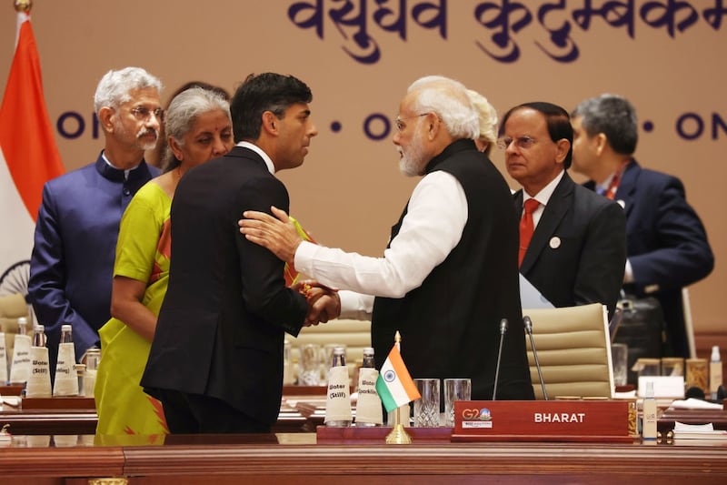 Prime Minister Rishi Sunak, left, bids farewell to Indian prime minister Narendra Modi 