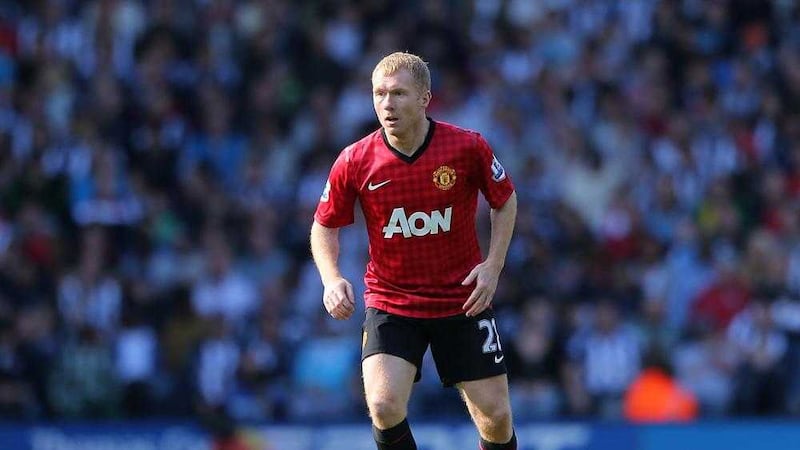 Manchester United&#39;s Paul Scholes in action for Manchester United during his 21 years at the club 