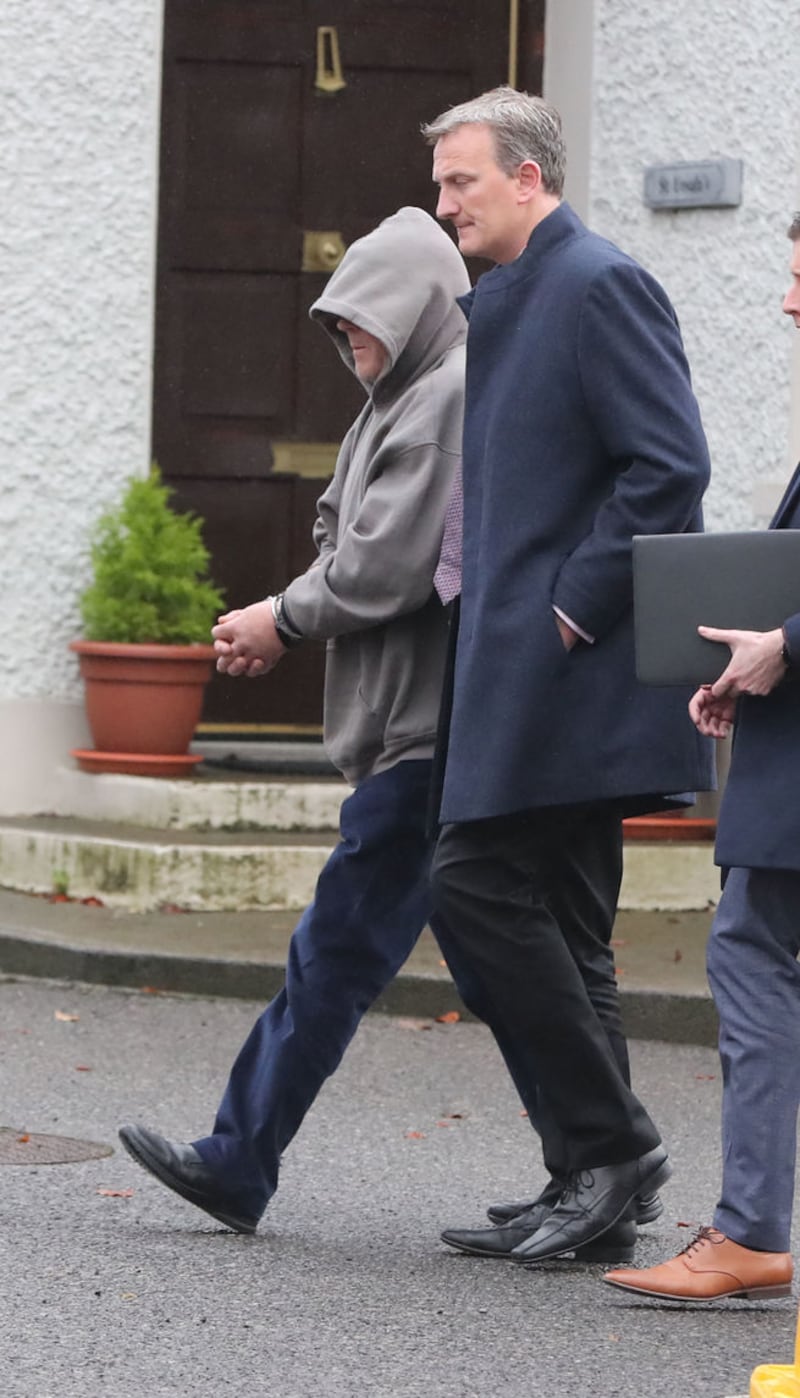 &nbsp;Luke O'Reilly (left) leaving Virginia District Court in Co Cavan where he was charged in relation to the assault and false imprisonment of Quinn Industrial Holdings director Kevin Lunney.&nbsp;Niall Carson/PA Wire
