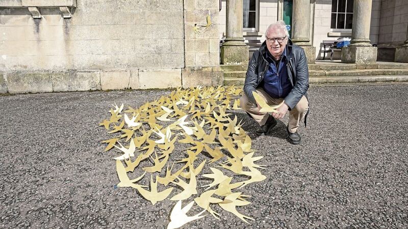 Arts Over Borders man Se&aacute;n Doran with the new golden swallow sculptures. Picture by Brian Morrison 