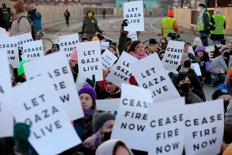 Protesters demanding a ceasefire in Gaza block traffic on the Benjamin Franklin Parkway in Philadelphia on Thursday (Charles Fox/The Philadelphia Inquirer via AP)