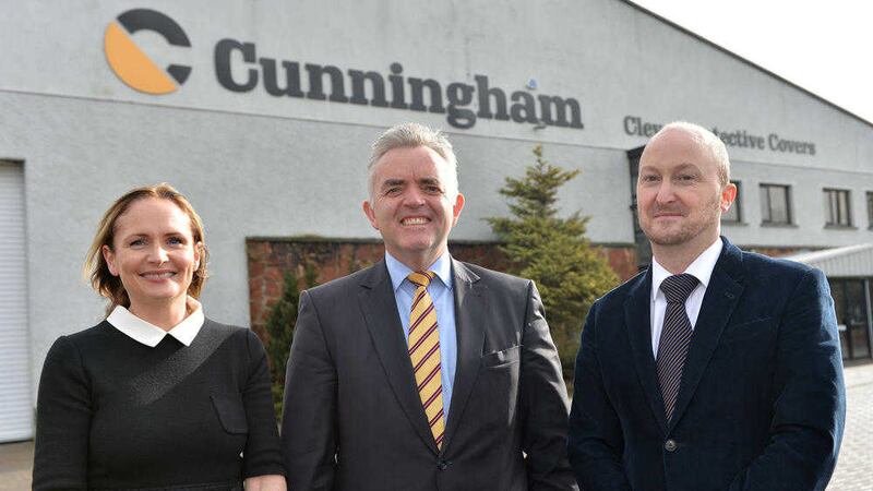Enterprise Minister Jonathan Bell pictured with David Cunningham and Briege Cunningham of Cunningham Covers, Maghera 