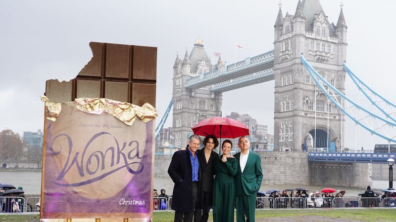 Hugh Grant, Timothee Chalamet, Olivia Colman and Rowan Atkinson during a photo call with the cast of Wonka at Potter’s Field Park, London (Ian West/PA)
