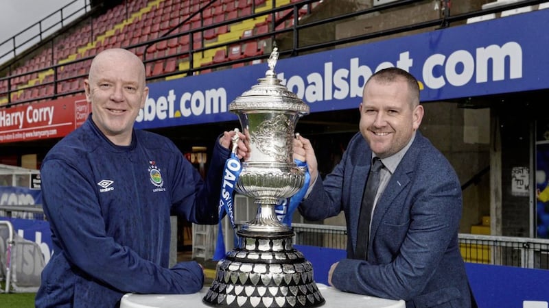 Linfield Swifts manager David Dorian (left) pictured at Seaview with Newington manager Conor Crossan ahead of the Steel &amp; Sons Cup final on Christmas Day final 