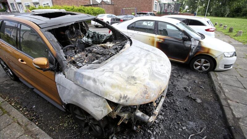 Two cars were set alight and a third sustained damage in an arson attack in the the Riverside area of Dunmurray. Picture Mal McCann. 