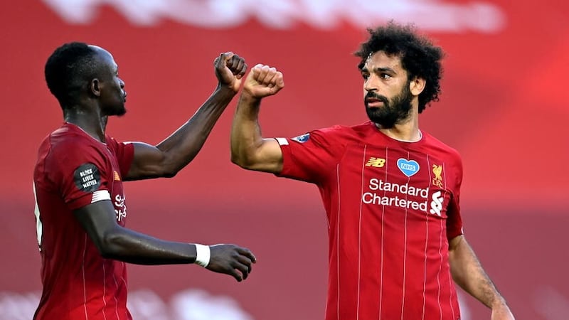 Mohamed Salah, right, and Sadio Mane shared the Golden Boot with Arsenal’s Pierre-Emerick Aubameyang as Liverpool pushed Manchester City all the way (Paul Ellis/NMC Pool/PA)