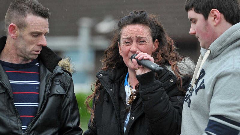 Vanessa Burke, mother of Christopher Meli, bursts into tears as she addresses the crowd at a rally in Twinbrook. Picture by Justin Kernoghan 