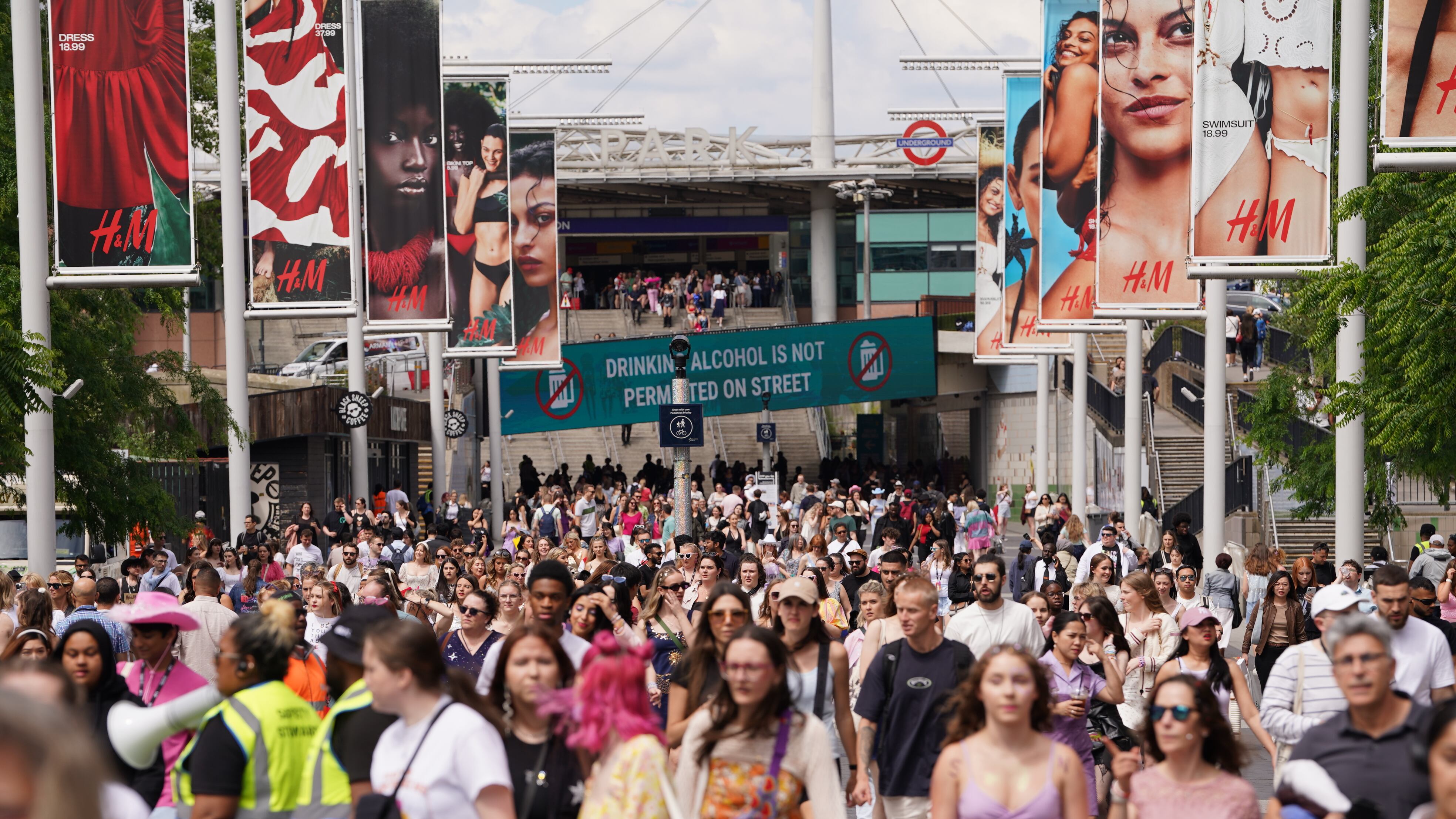 Fans gather outside Wembley Stadium in London, ahead of a Taylor Swift concert in 2024