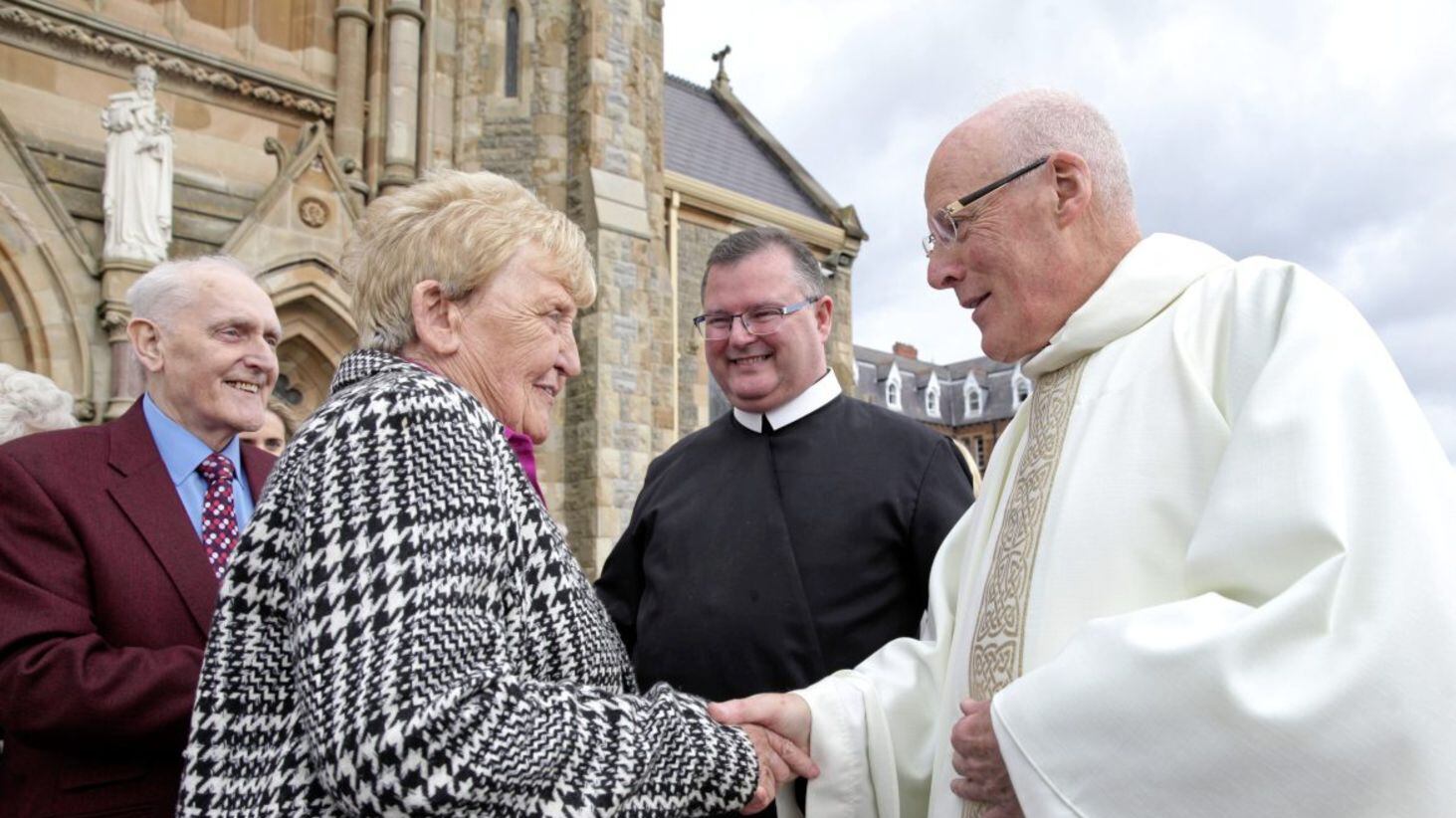 Fr Noel Kehoe (left), outgoing Rector of Clonard and Fr Peter Burns, the incoming Rector of Clonard, are greeted by well-wishers at Clonard yesterday. Picture: Ann McManus 