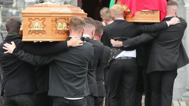 &nbsp;The coffins of Eileen and Jamie O'Sullivan are carried into St Michael's Church in Lixnaw in North County Kerry.