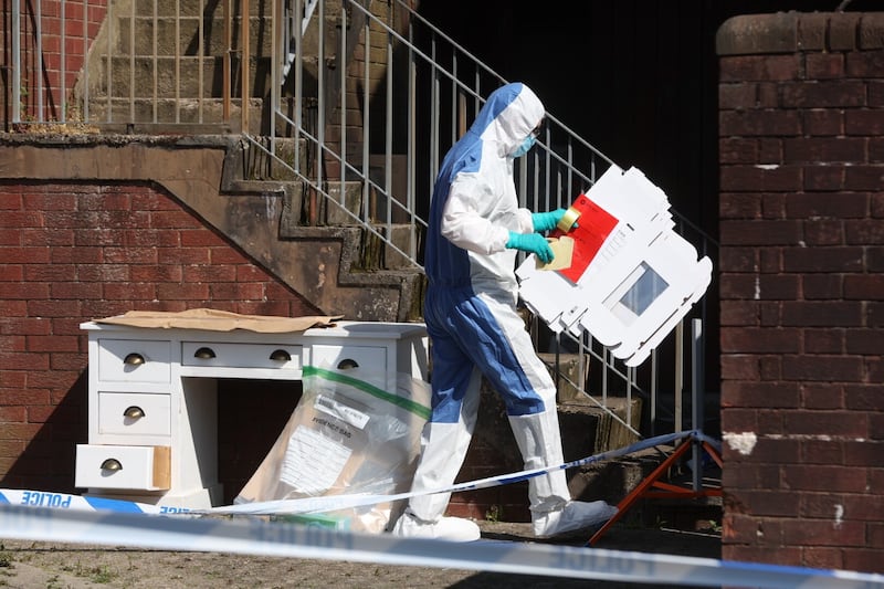 Forensic officer at a property in James Street Ballymena. Picture Mal McCann