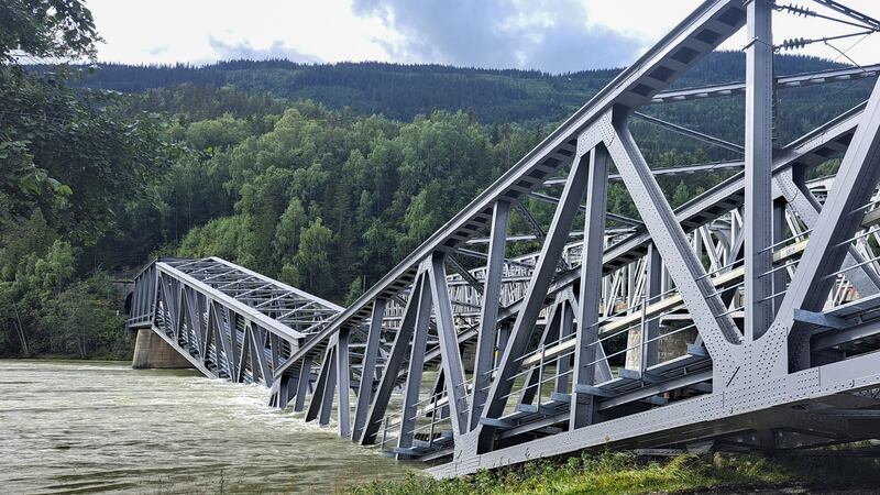 A section of a railway bridge collapsed into the water over the Laagen River in Ringebu, Norway (Lars Skjeggestad Kleven/NTB Scanpix via AP)