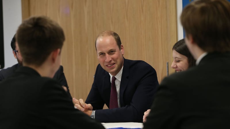 &nbsp;The Duke of Cambridge talks to students from Our Lady &amp; St Patrick&Otilde;s College, Knock during a visit to Inspire, a charity and social enterprise which focuses on promoting wellbeing for all across the island of Ireland, as part of his tour of Belfast. <br />Niall Carson/PA Wire