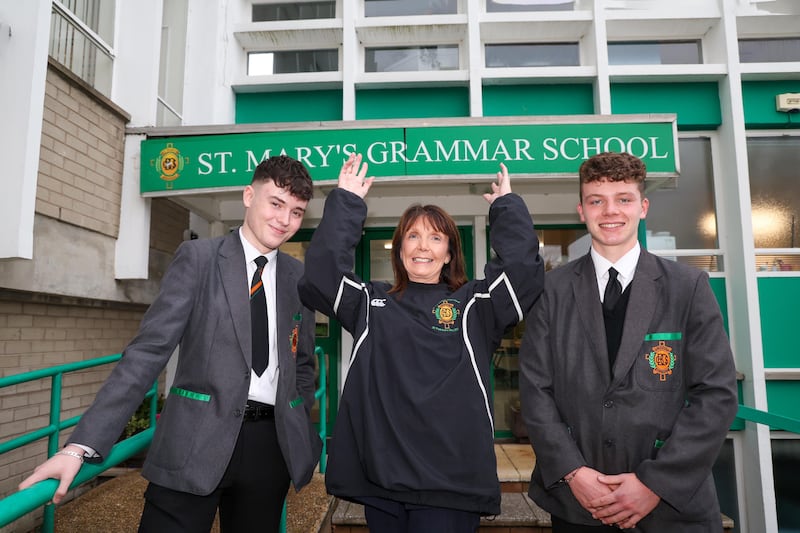 Year 14 pupils Mark Tierney and Ronan Bradley and Siobhan Kelly, principal of St Mary's Grammar. Picture by Mal McCann