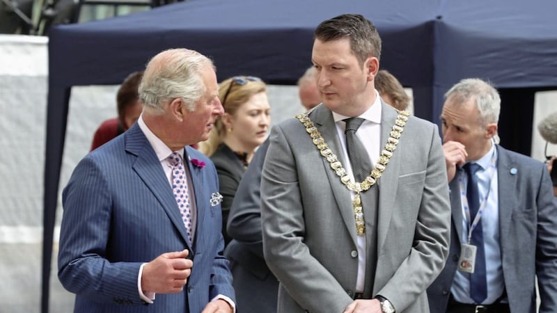 John Finucane, wearing his mayoral chains, speaking with Prince Charles in May this year 