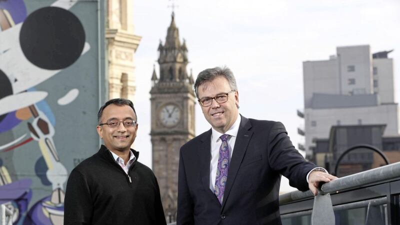 Just days before announcing his shock resignation, Invest NI chief executive Alastair Hamilton is seen with Raj Ramanand, CEO of Silicon Valley tech company Signifyd, which is opening an operation in Belfast creating 150 jobs. Photo: William Cherry/PressEye 