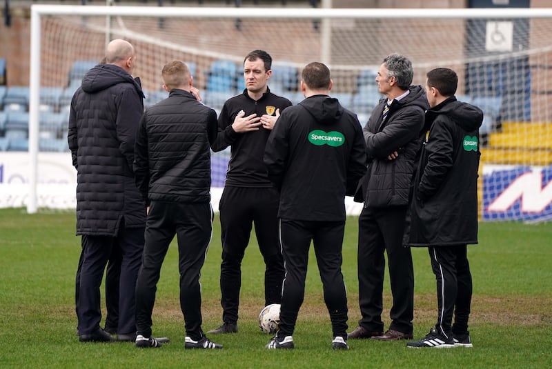 Referee Don Robertson called the game off following a pitch inspection