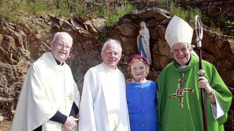 Bishop Anthony Farquhar, pictured right, celebrated the annual &#39;Saul Sunday&#39; Mass on Slieve Patrick with, from left, Canon Noel Conway, Fr John McManus and 94-year-old Jeannie Mullan from Kilclief. Picture by Bill Smyth 