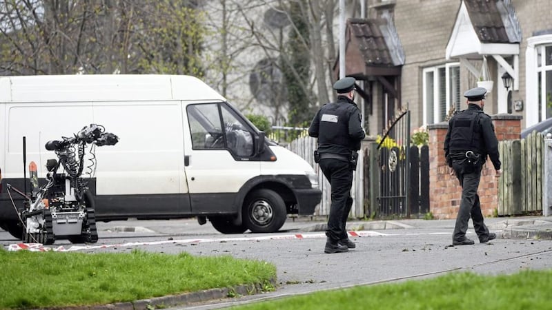 Police believe a car at Azalea Gardens in the Twinbrook area may be linked to an armed robbery. Picture by Justin Kernoghan/PhotopressBelfast.co.uk  