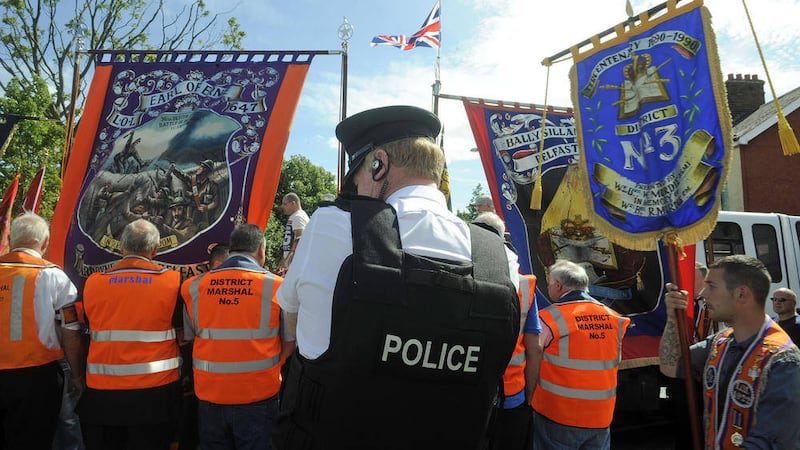 Orangemen march to a police line on the Woodvale Road in north Belfast in 2013. Picture by Justin Kernoghan 