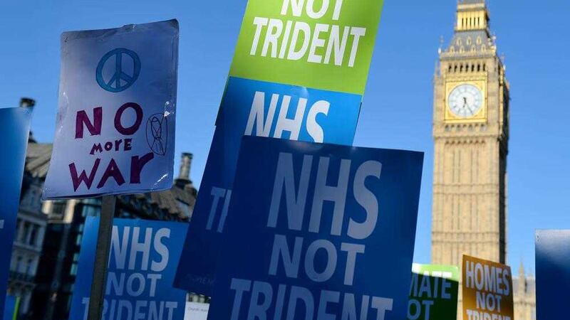 Demonstrators at an anti-Trident CND rally in Parliament Square, London. Picture by Dominic Lipinski, Press Association              