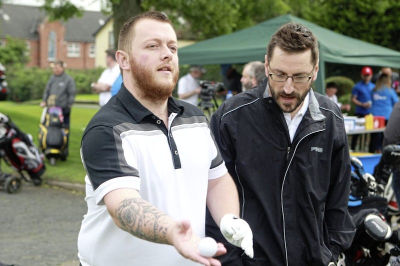 Snooker player Mark Allen with Stephen Knox before teeing off at the Oscat Knox Cup. Picture Matt Bohill. 