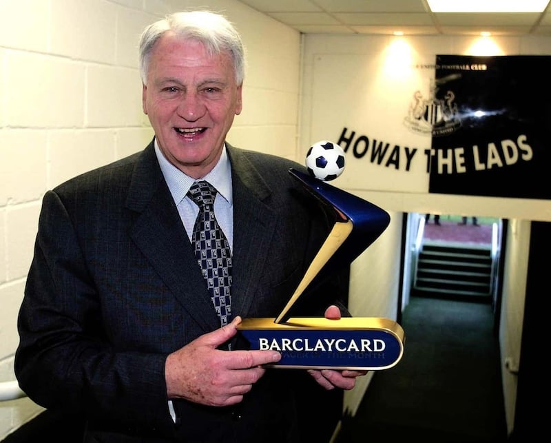 Sir Bobby Robson celebrates a Premier League manager of the month award in 2003