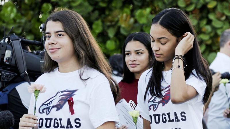 Students walk to class at Marjory Stoneman Douglas High School in Parkland, Florida on Wednesday. Picture by Terry Renna, Associated Press 