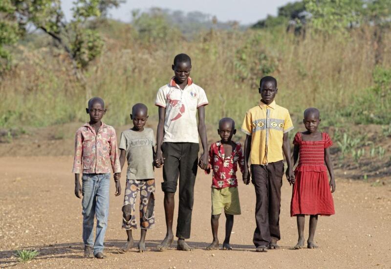 Richard Mwaka. aged 17, has been looking after his four brothers and little sister - Godfrey, 14, Reagan, 12, Ivan Agnerwot, 9, Ivan Onono, 5, and Prossy, 7 - since their mother was killed in the South Sudan conflict. They lost their father to disease some years ago. They are now living in the Palabek Refugee Settlement Camp in northern Uganda, supported by Tr&oacute;caire. Picture by Mark Stedman 