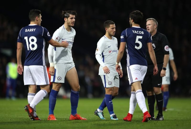 Chelsea’s Alvaro Morata (left) and West Bromwich Albion’s Claudio Yacob (right) exchange words during the Premier League match at The Hawthorns stadium
